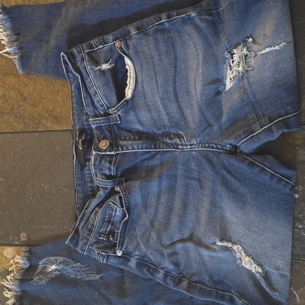 Distressed Blue Jeans